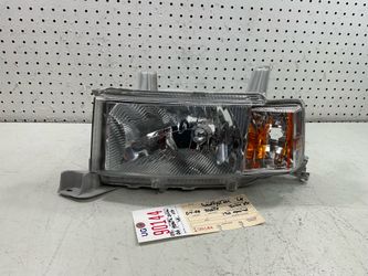 2004 2006 TOYOTA SCION XB LEFT SIDE HEADLIGHT LAMP OEM