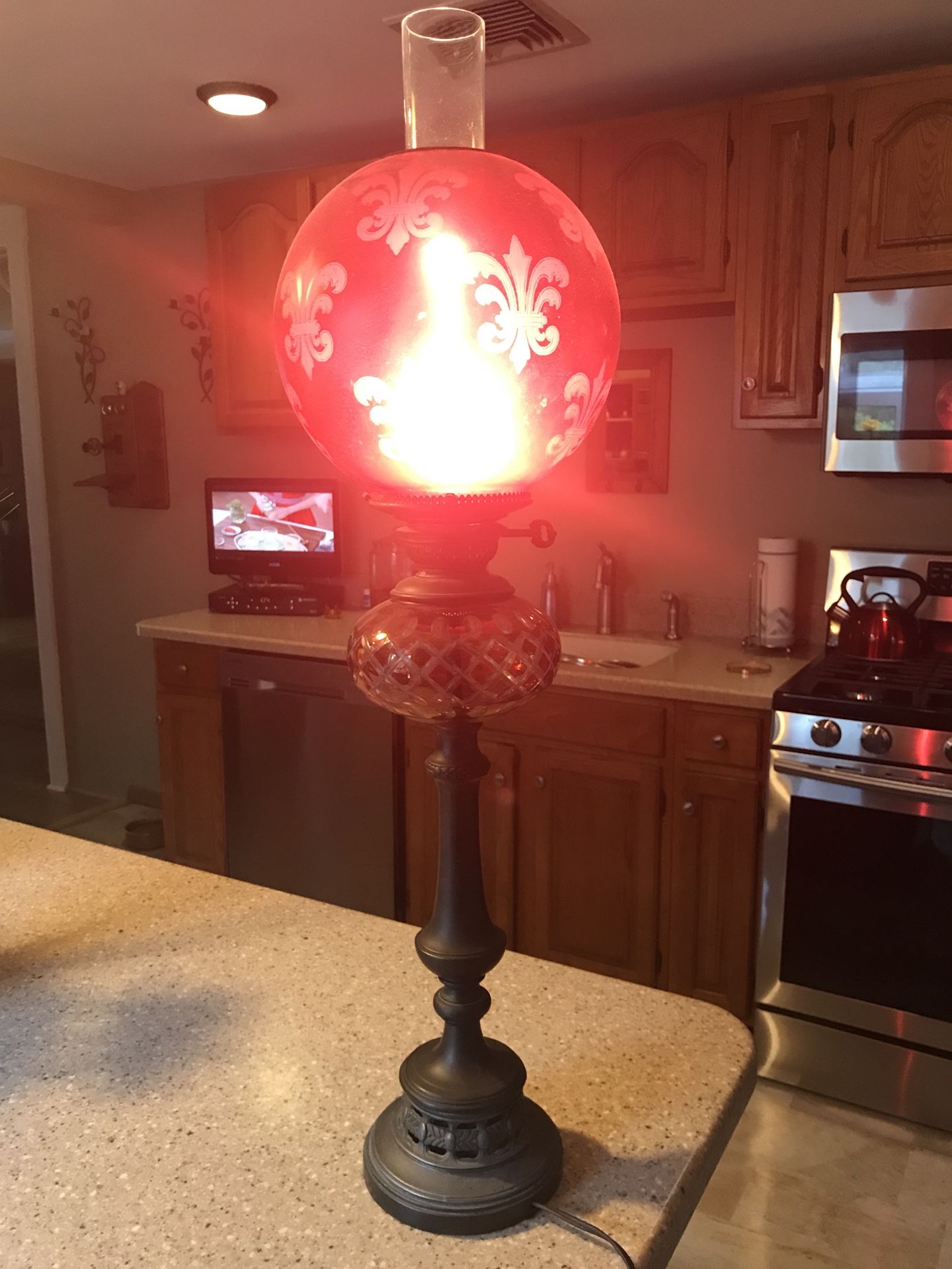 Antique ruby red hurricane lamp with etched design