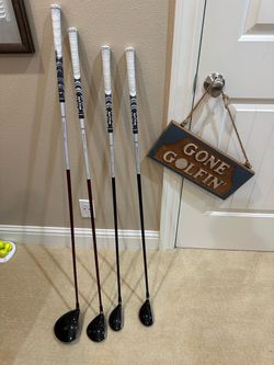 TaylorMade R9 driver, R9 3 wood and 18&22 degree rescues.