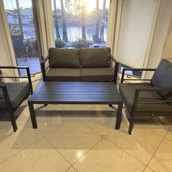 Brand new 4 Piece aluminum patio furniture set