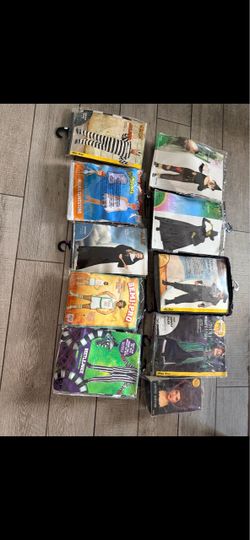 Lot of Halloween Costumes in Packaging