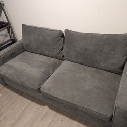 Light Grey Sofa-Living Spaces Like New