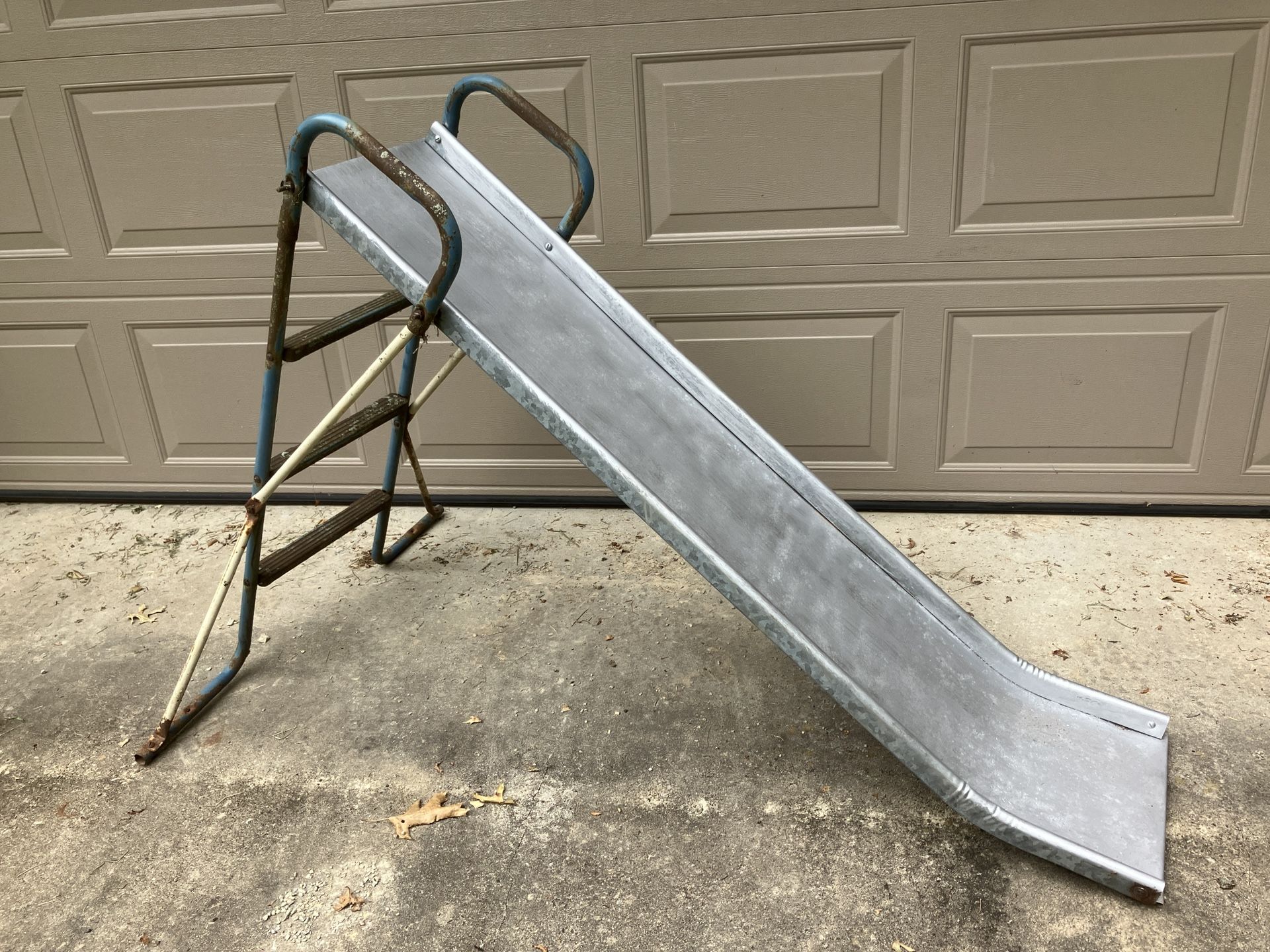 Kids Slide…vintage steel made to last playground fun