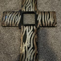 Cross - glitter pattern, metal with glass center.