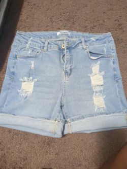 Blue distressed jean shorts