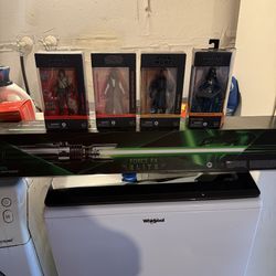 Brand new StarWars bundle 4 figures and lightsaber
