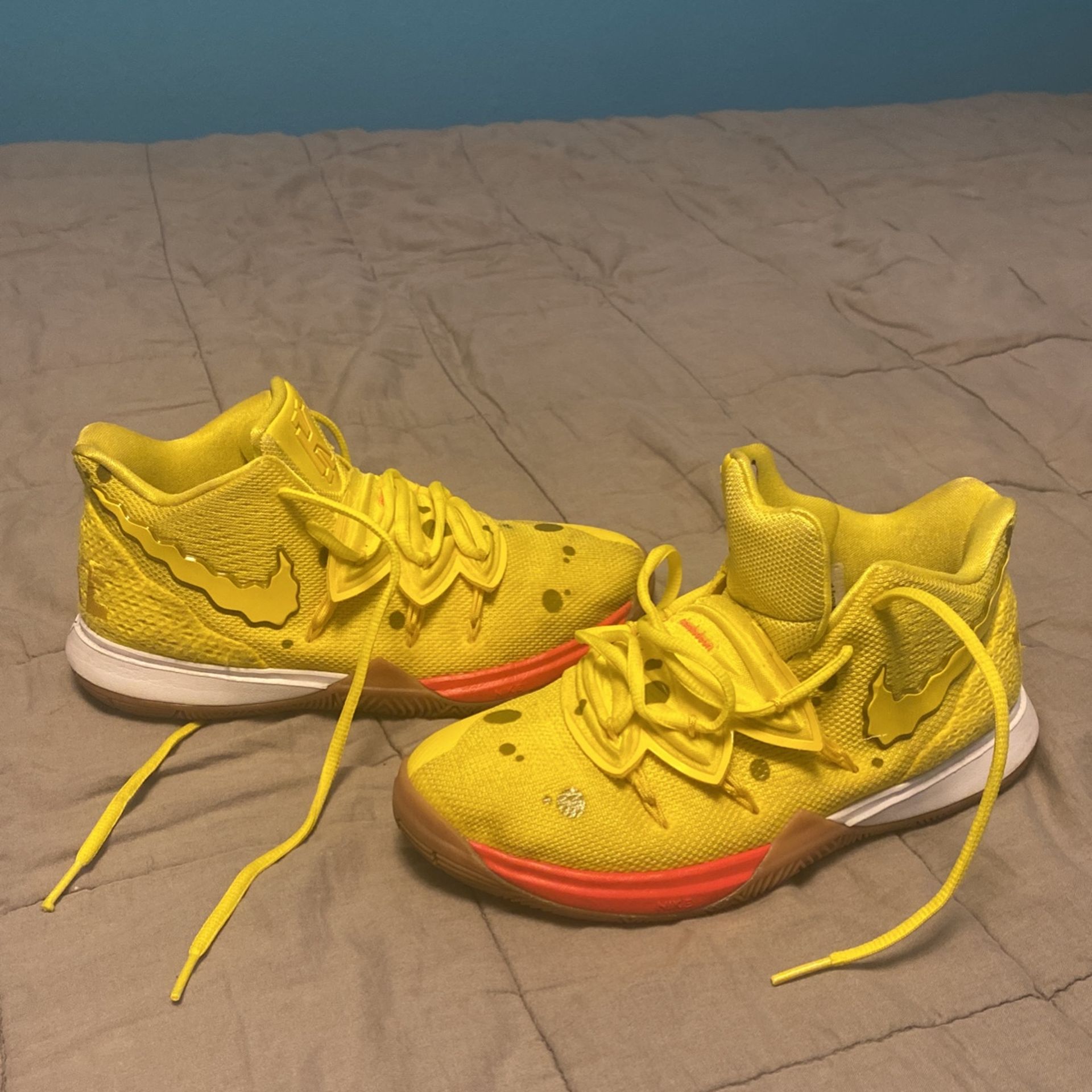The Nike Kyrie Spongebob GS comes in a mixture of different