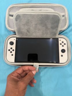 Nintendo switch oled w/games + 256gb mem card