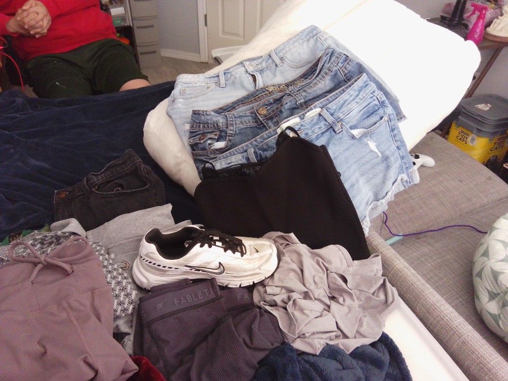 Shoes And Pile Of Good Clothes