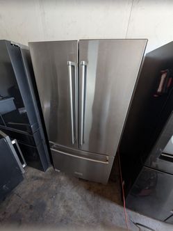Kitchenaid stainless steel counter depth French door refrigerator with internal ice and water dispenser