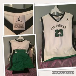 Four sets of Michael Jordan basketball jerseys and shorts