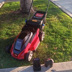 TORO 60V CORDLESS  LAWM MOWER SELF PROPELLED  BATTERY  AND CHARGER 