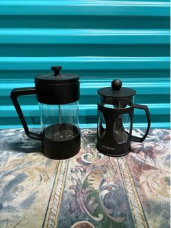 These are Gadpiparty Borosilicate Glass Coffee Press and Mr. Coffee French press coffee makers featuring a black plastic frame and handle