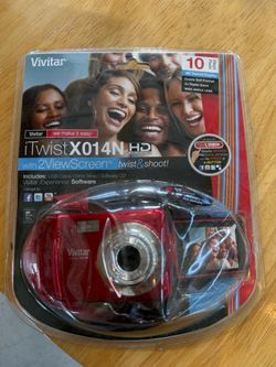 Vivitar ViviCam iTwist X017 10.1MP HD Digital Camera Swivel Twist SEALED NEW. Plastic is dented see pics