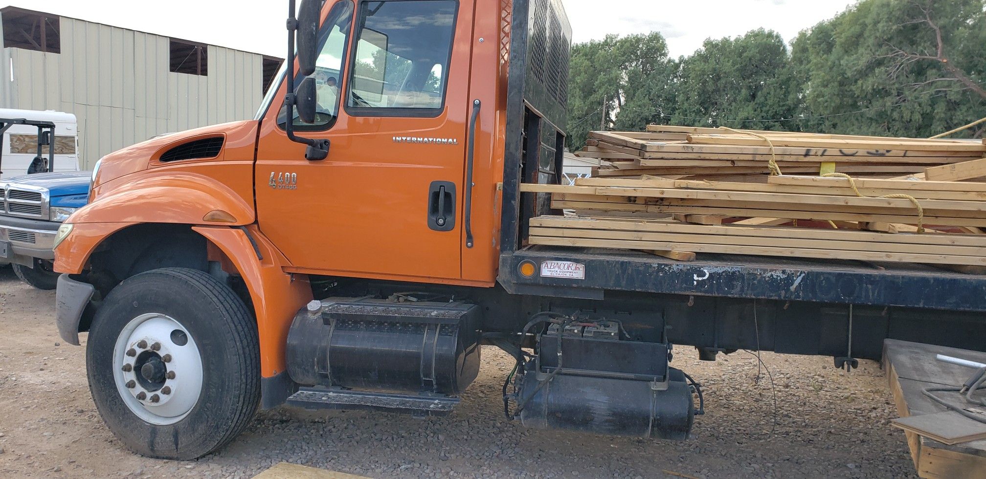2006 International 4400 DT Flatbed 26ft With piggyback forklift low miles. MONEY MAKER. 34999.00 TODAY!