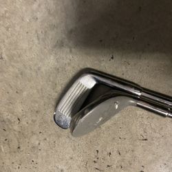set of 2 unbranded golf clubs
