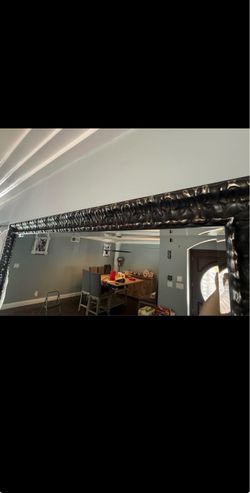 Large Beveled Wall Mirror with Ornate Black and Gold Frame