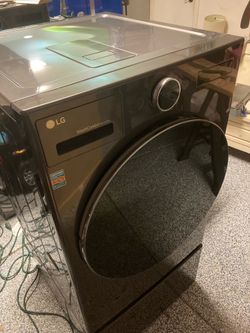 LG washer/dryer model WM6698hba high efficiency all-in-one With Pedestal.