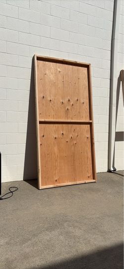 Wood panels on some 2x3s