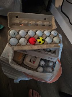 121 used golf balls
