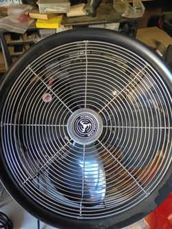The HydroMist  heavy-duty 18-inch shrouded oscillating misting fan