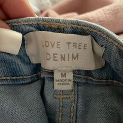 The brand of the jean skirt