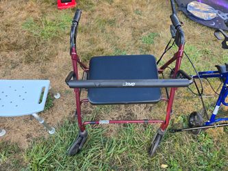 Rolling walker with seat and shower seat