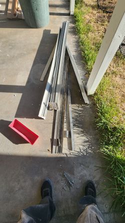 Older aluminum framed sliding glass door