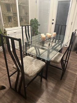 Glass dining table with 4 chairs