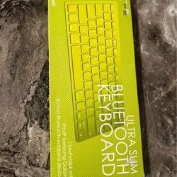 new sealed Bluetooth ultra slim Bluetooth keyboard