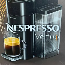 Like new NESPRESSO Vertuo coffee machine (color red) plus stainless steel coffee capsule.