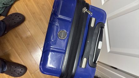 Blue carry on Lucas Luggage MSY AIRPORT