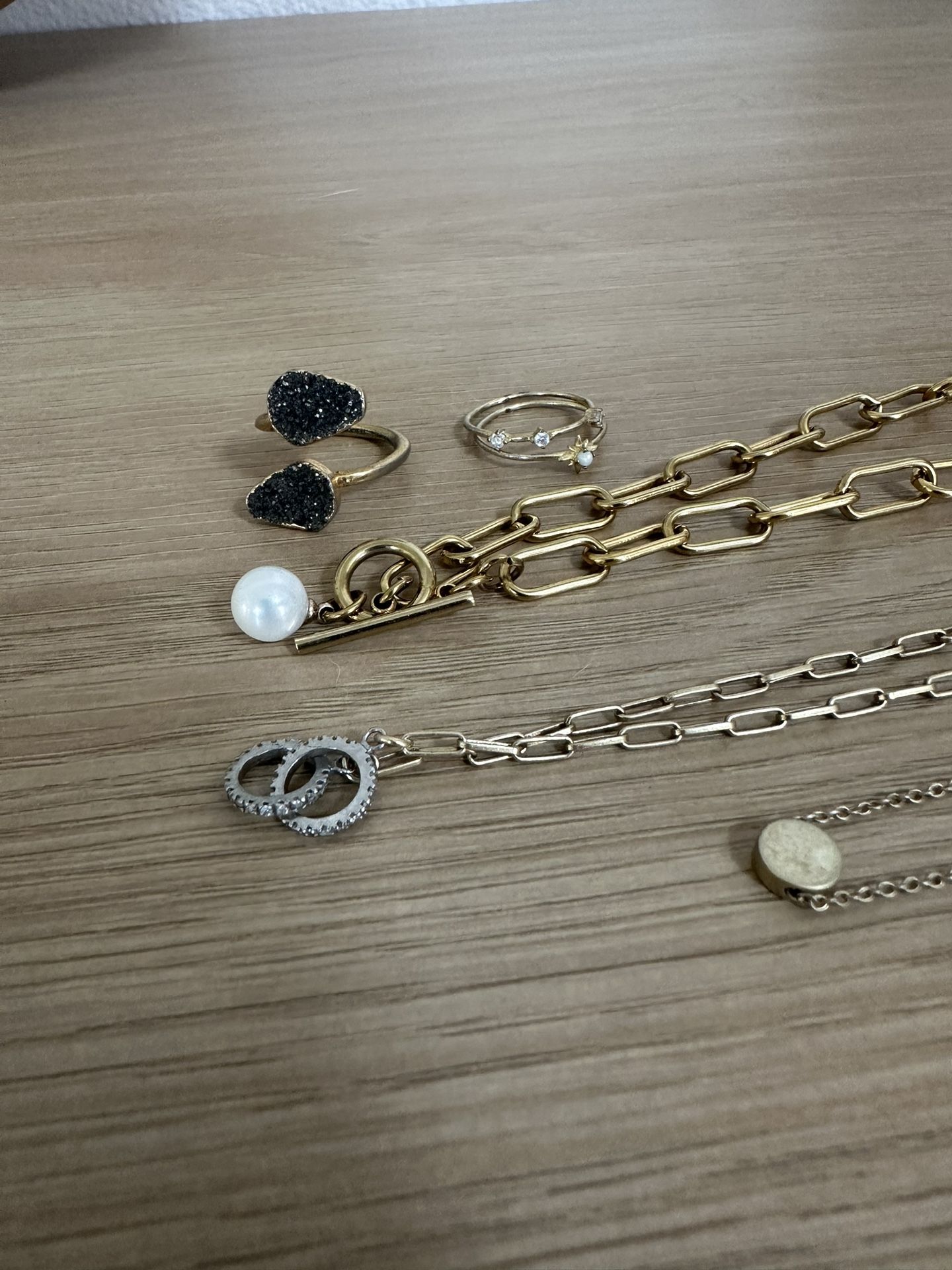 All Gold plated. Some parts faded but all gold plated originally. Real druzy stone and moonstone rings by Gorjana. Real silver pendant.