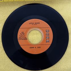 Artist: Ernie K. Doe Label: Duke Records, catalog number 423 A-Side Track: "Until The Real Thing Comes Along" B-Side Track: "Little Marie" Release Yea