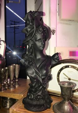 Cast iron women statue