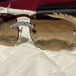 2 Pair Of Cartier Glasses With Paperwork and box