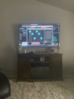 75 inch LG TV and Fireplace