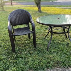 Four Chairs And A Table