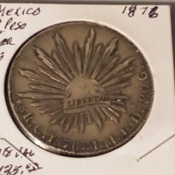 Antique Mexican 8 Reales silver coin minted in 1876