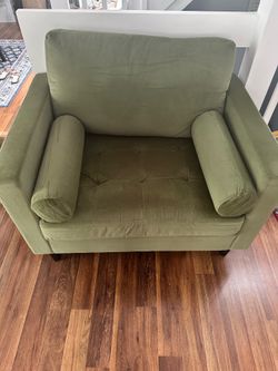 Green velvet armchair