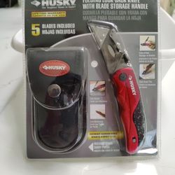 Husky Utility Knife with Belt Clip Pouch Located In Palm Beach Gardens 
