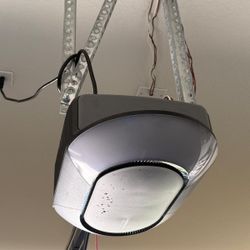 Garage door opener Chamberlane. With garage door frame and spring. Backup power and remotes.