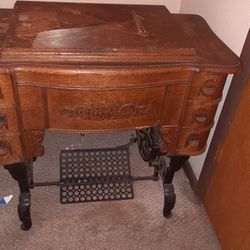 Antique White Tredle Sewing Machine In Cabinet
