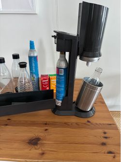 SodaStream Aqua Fizz, two co2 tanks, flavors and bottles
