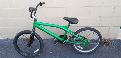 Green BMX Freestyle bike