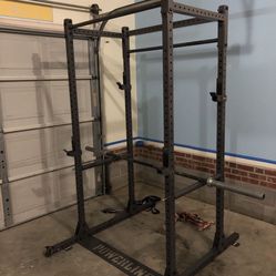 Squat Rack, Bar, And Weights 