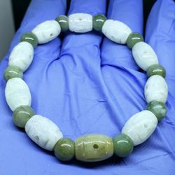 Burmese icy type A jadeite jade bracelet rice beads hollowed.