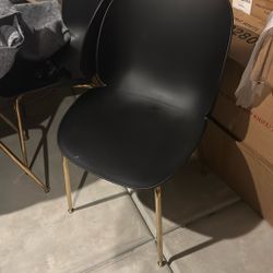 Black and gold dining room tables