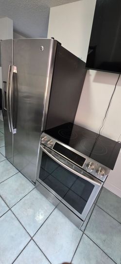 Estufa Samsung  y refrigerador 33
