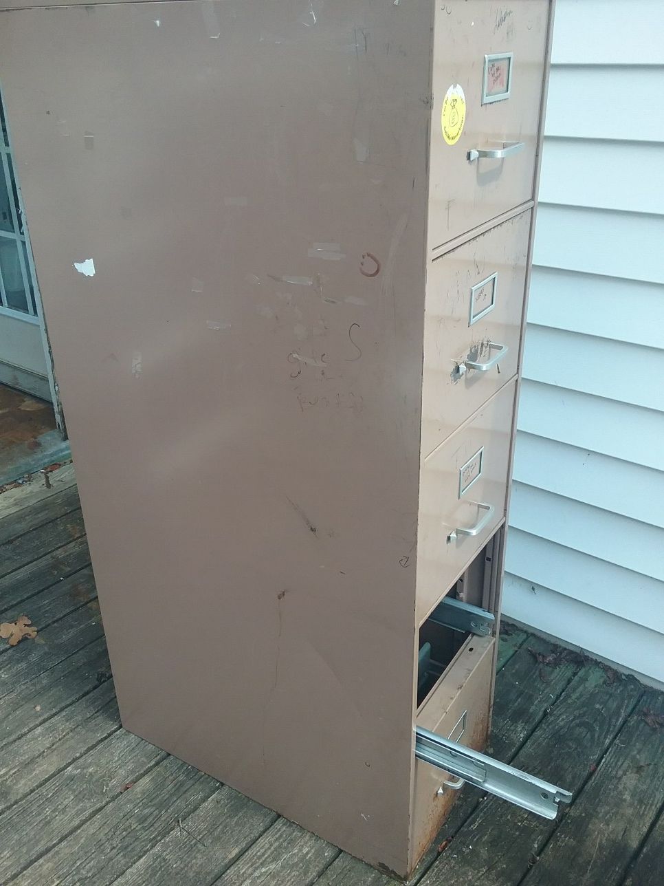 File cabinet and push mower free for scrap in pelzer. 1st come first